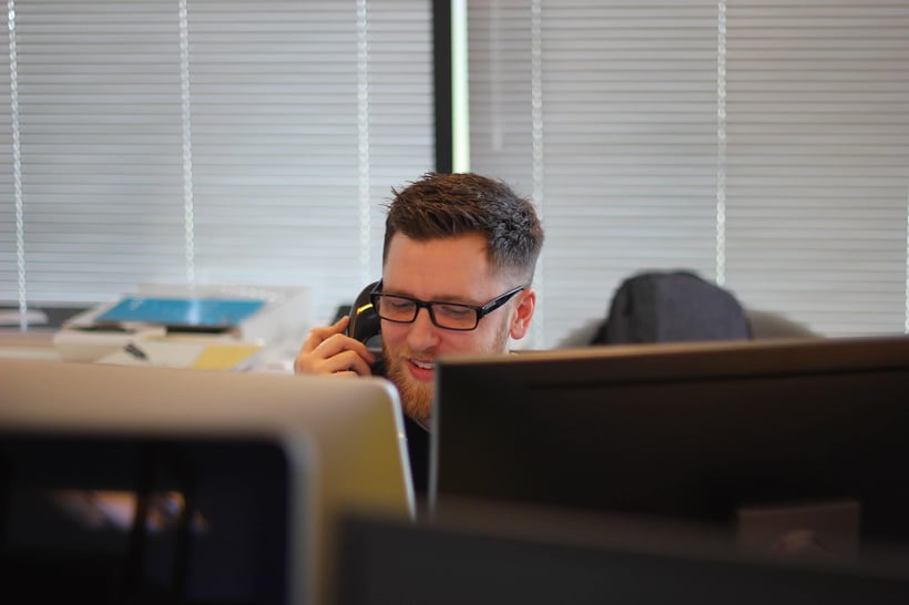Cirrus Insight. Salesman on phone.