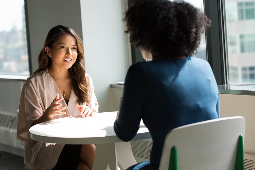 Cirrus Insight. Women meeting at a table.